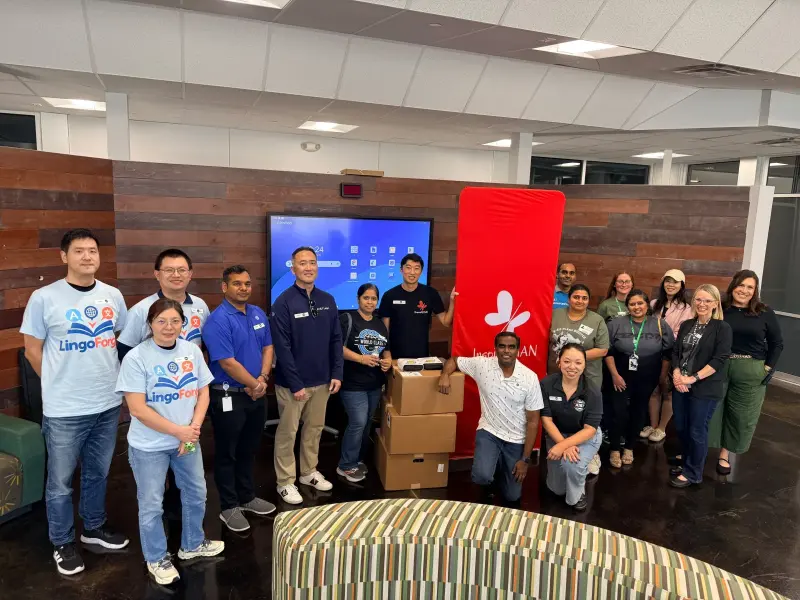AT&T representatives and volunteers with the donation
