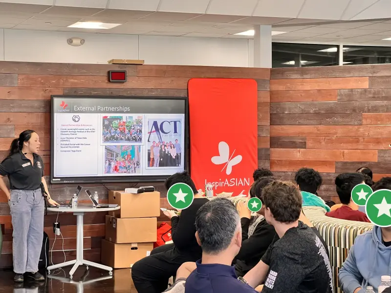 An AT&T representative presenting to students