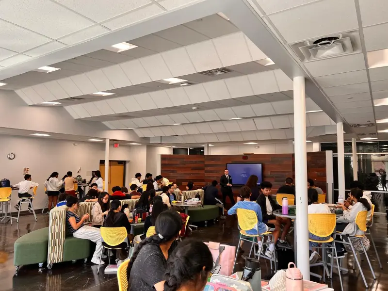 Students at lunch during the talk